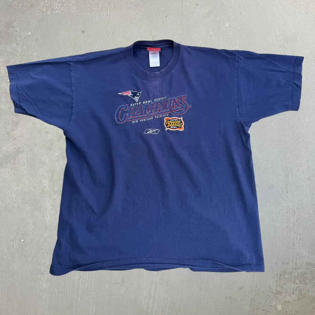 J- Vintage '04 New England Patriots Super Bowl 38 Champions NFL Reebok Embroidered Tee - L sold by HG Vintage