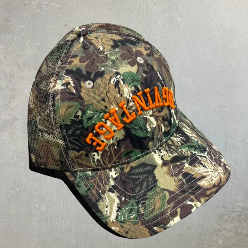 HGV Reverse Logo Camo Mesh Trucker Hat sold by HG Vintage