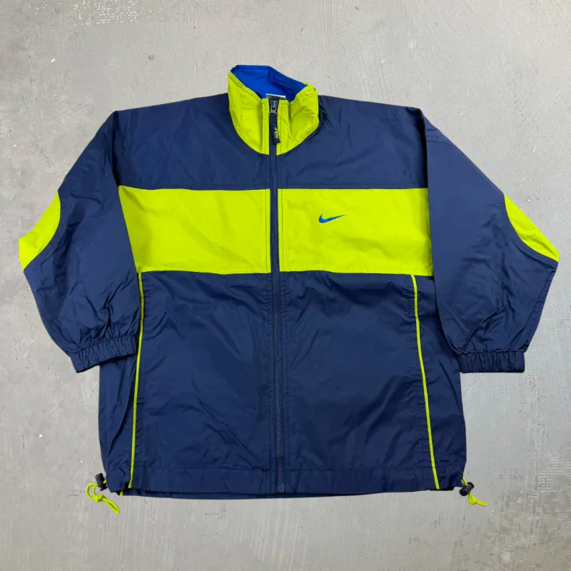 J- Vintage Nike Embroidered Swoosh Zip Up Lightweight Jacket - L made by HG Vintage