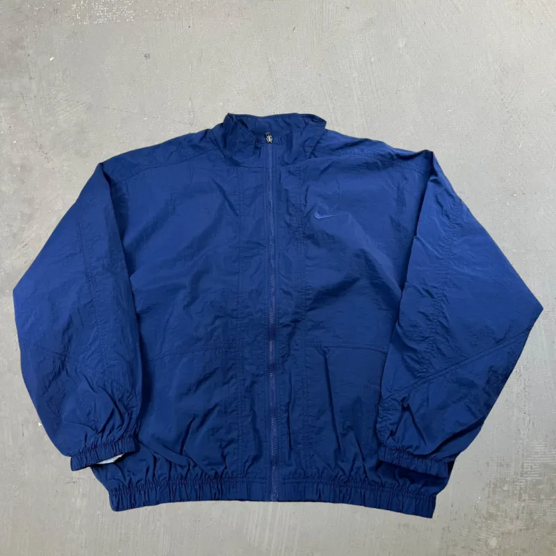 J- Vintage Nike Embroidered Swoosh Navy Zip Up Lightweight Jacket - XL made by HG Vintage