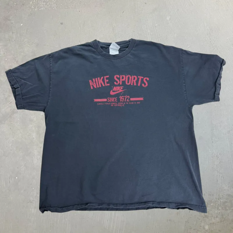 J- Vintage Nike Sports Text Graphic Tee - 2XL made by HG Vintage