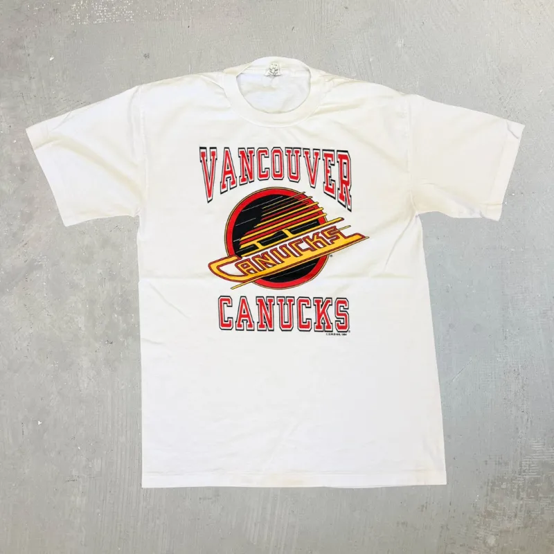 J- Vintage '94 Vancouver Canucks NHL Logo & Text Graphic Single Stitch Tee - M made by HG Vintage