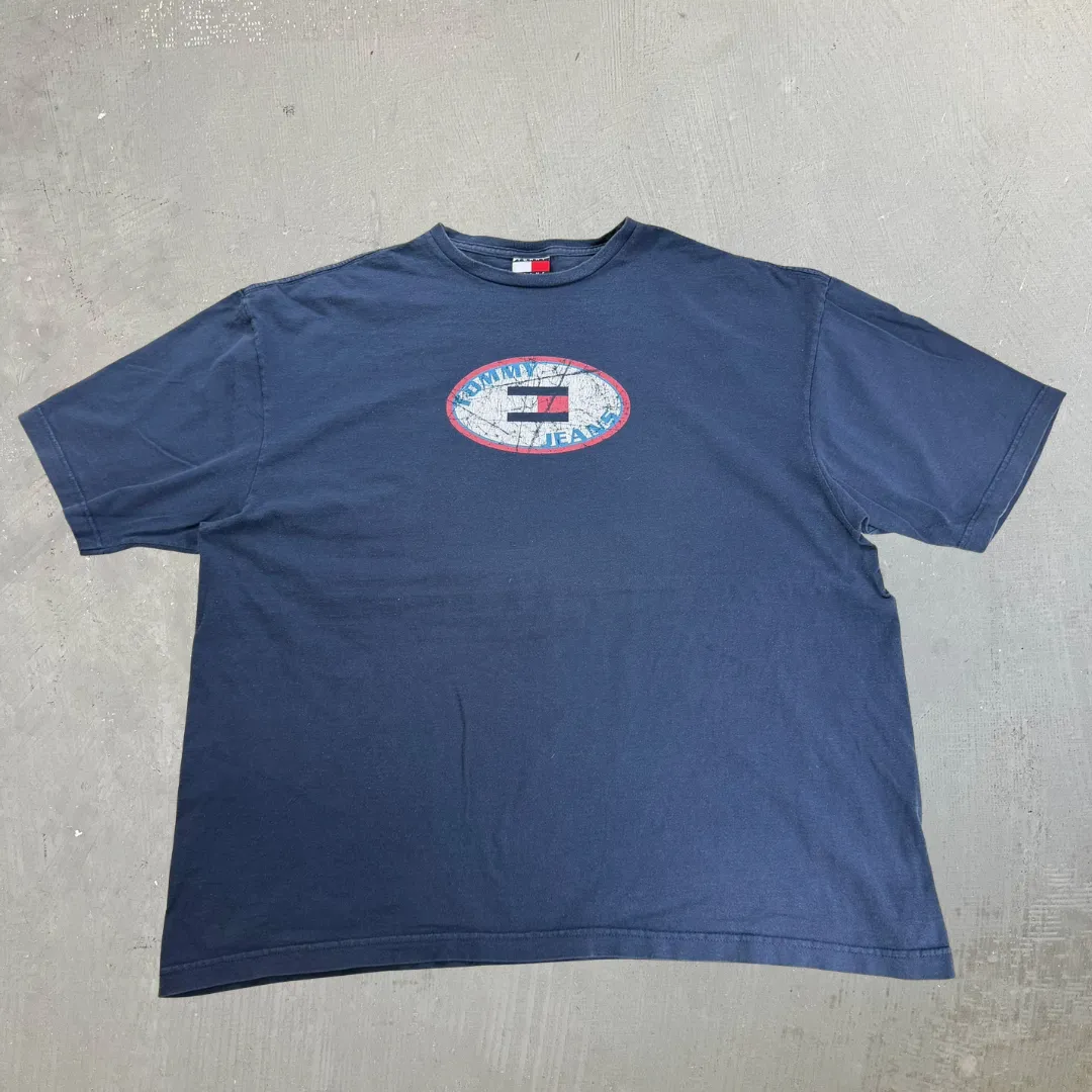 J- Vintage Tommy Hilfiger Logo & Text Tee - 2XL sold by HG Vintage