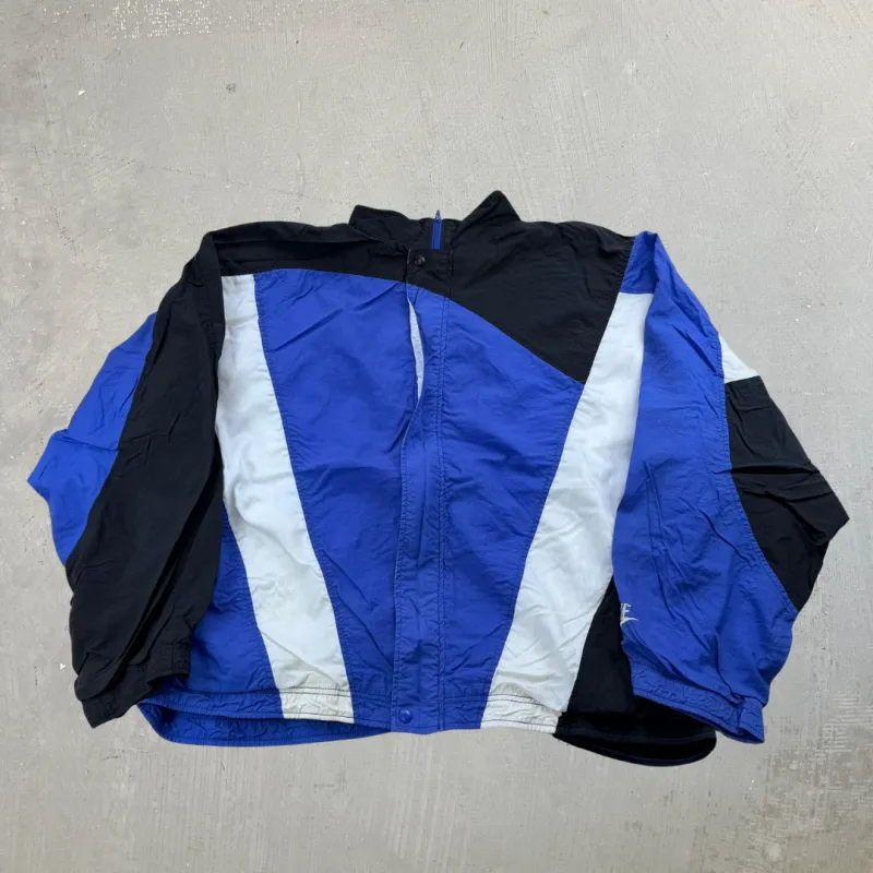 J- Vintage Nike Blue/Black Lightweight Zip Up Jacket  - 2XL made by HG Vintage