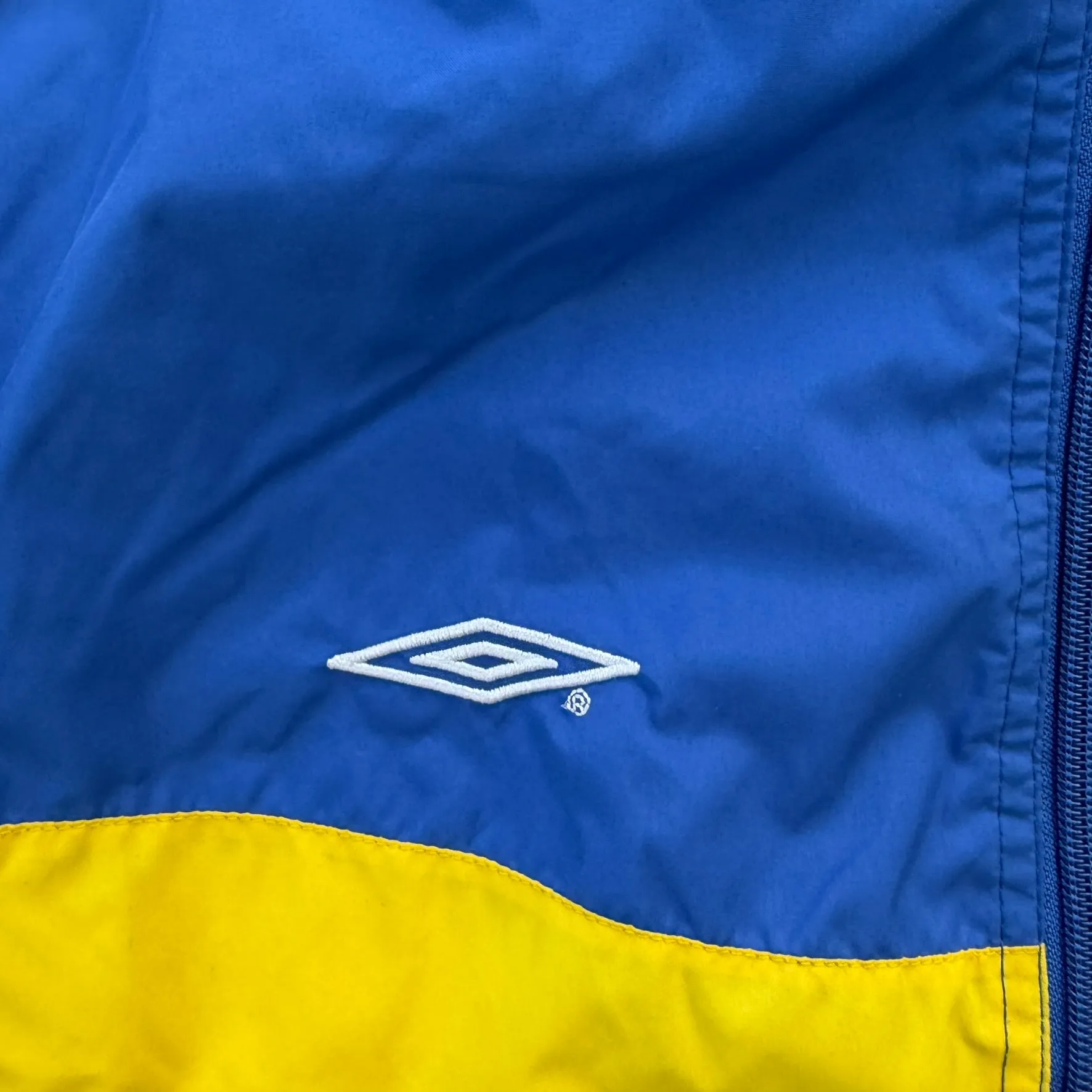 J- Vintage Umbro Yellow/Blue Zip Up Lightweight Jacket - M sold by HG Vintage product image thumbnail 2