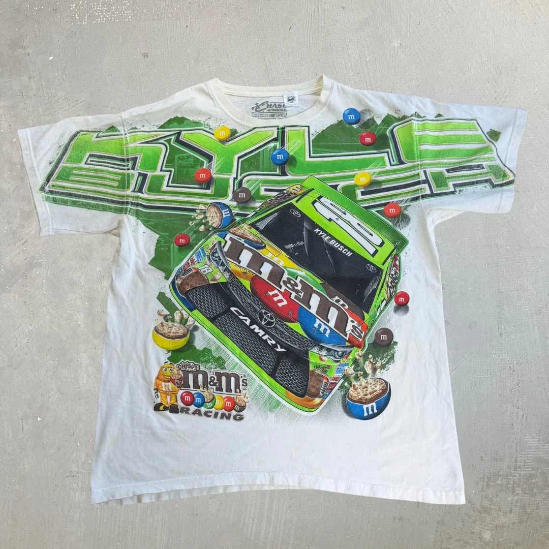 J- Vintage Nascar Kyle Busch M&M Car Graphic Tee - L sold by HG Vintage