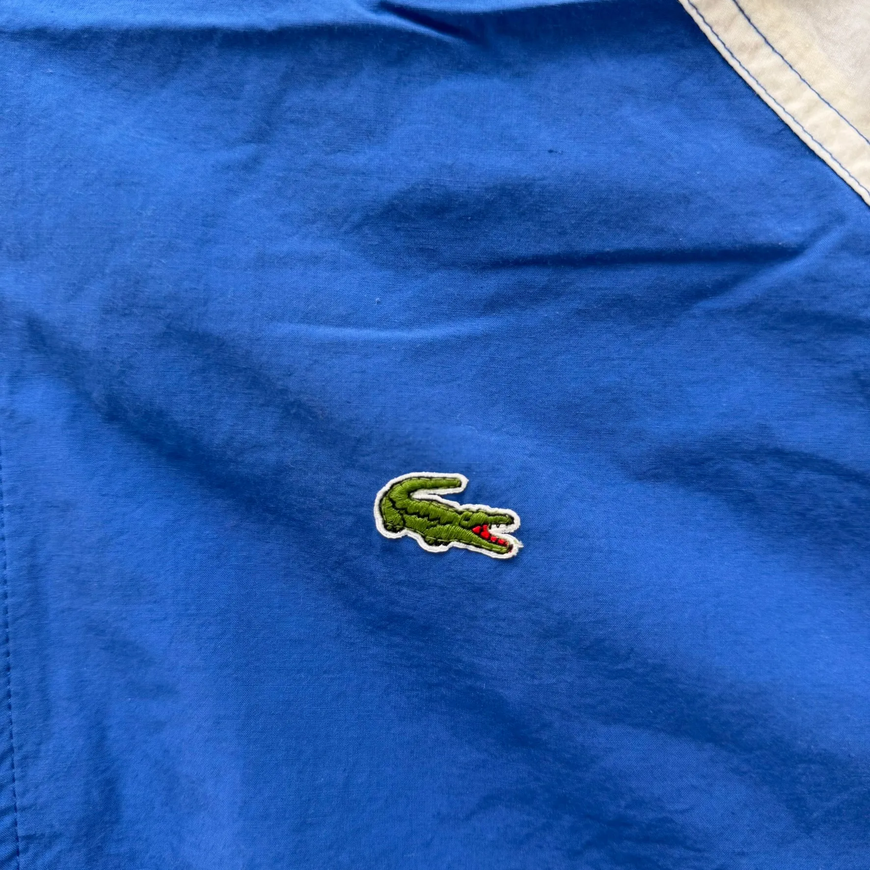 J- Vintage Lacoste Blue/White Zip Up Windbreaker - XL sold by HG Vintage product image thumbnail 2