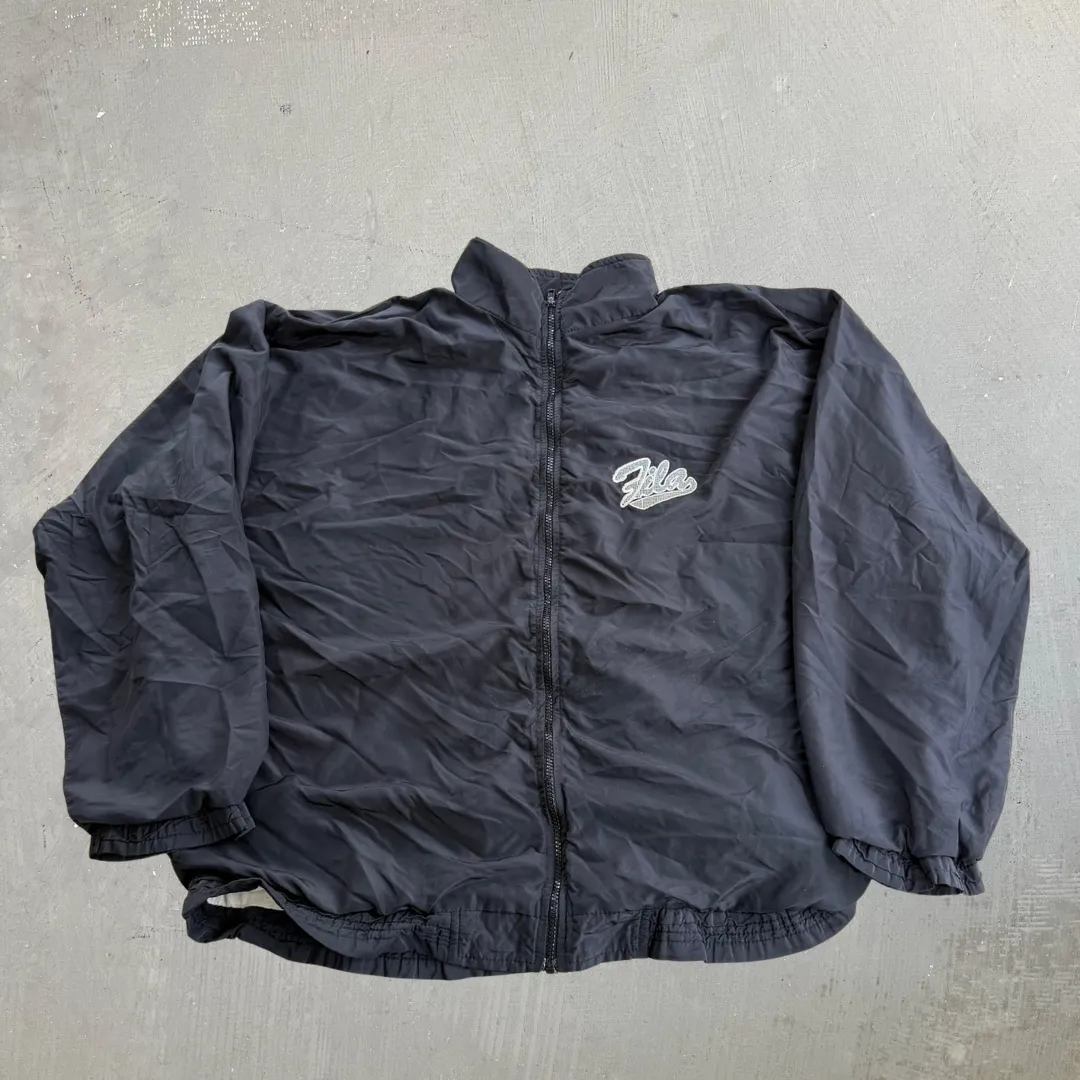 J- Vintage Fila Black Made In Italy Zip Up Windbreaker - XL sold by HG Vintage