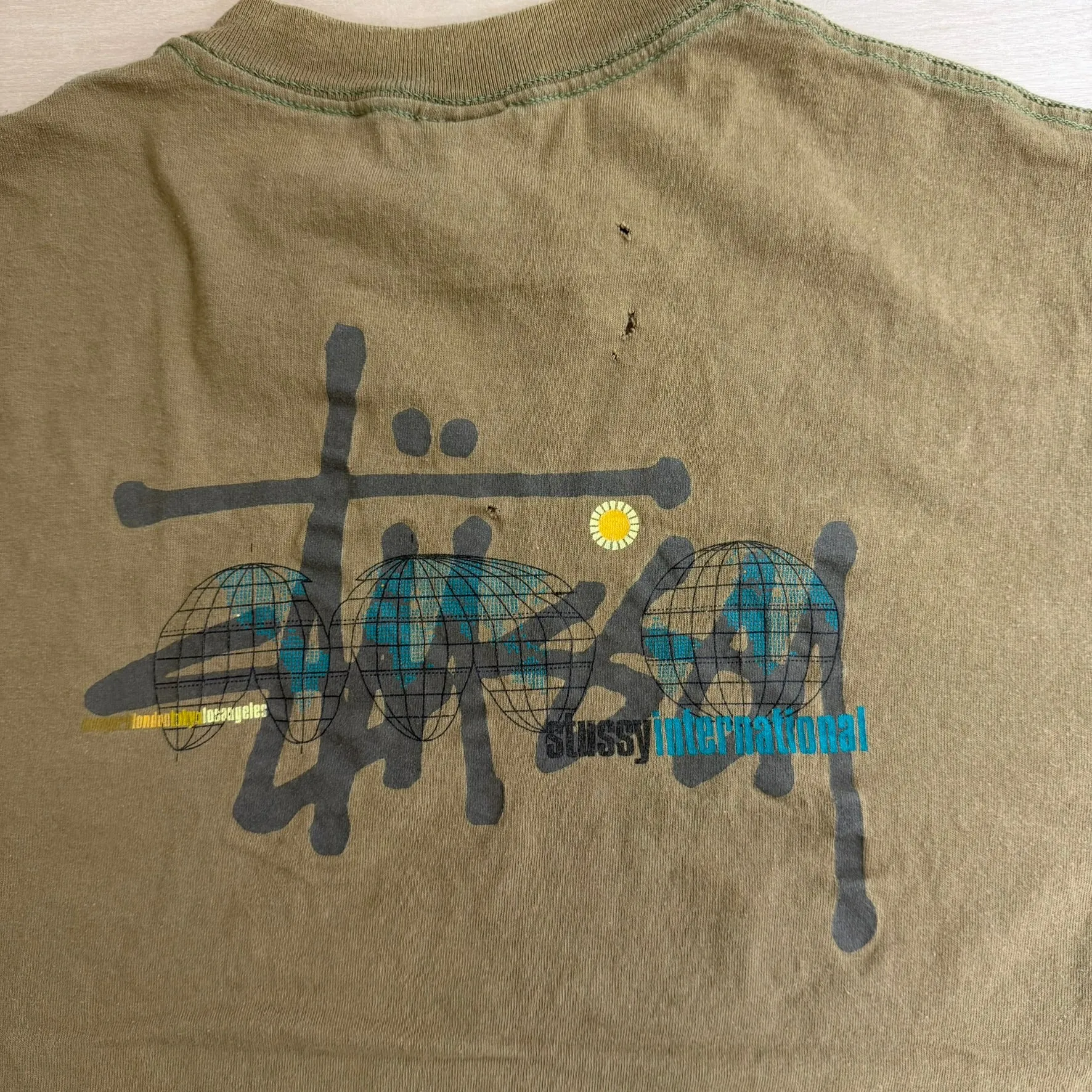 J- Vintage Stussy International Text Made In USA Single Stitch Tee - L sold by HG Vintage product image thumbnail 5