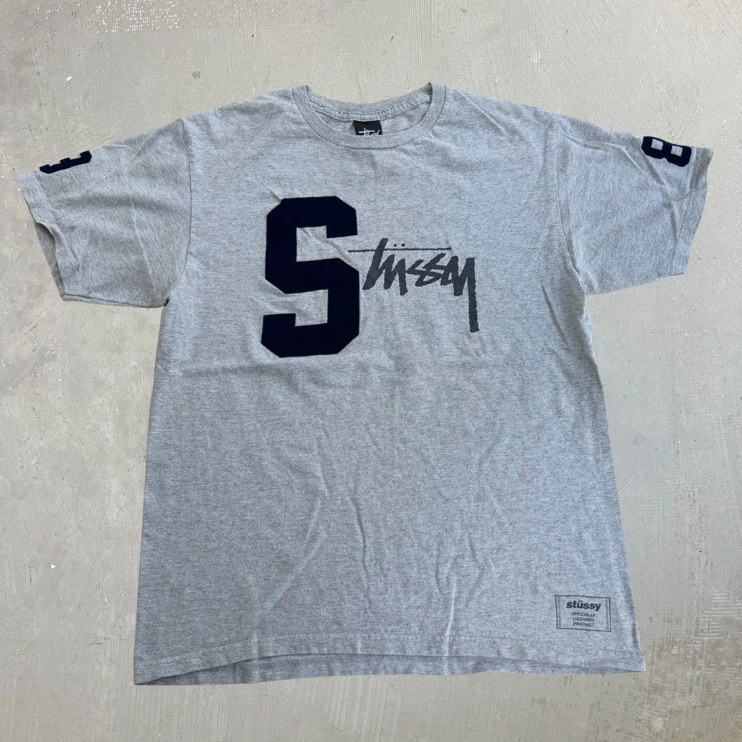 J- Vintage Stussy Felt Text Graphic Tee - M sold by HG Vintage