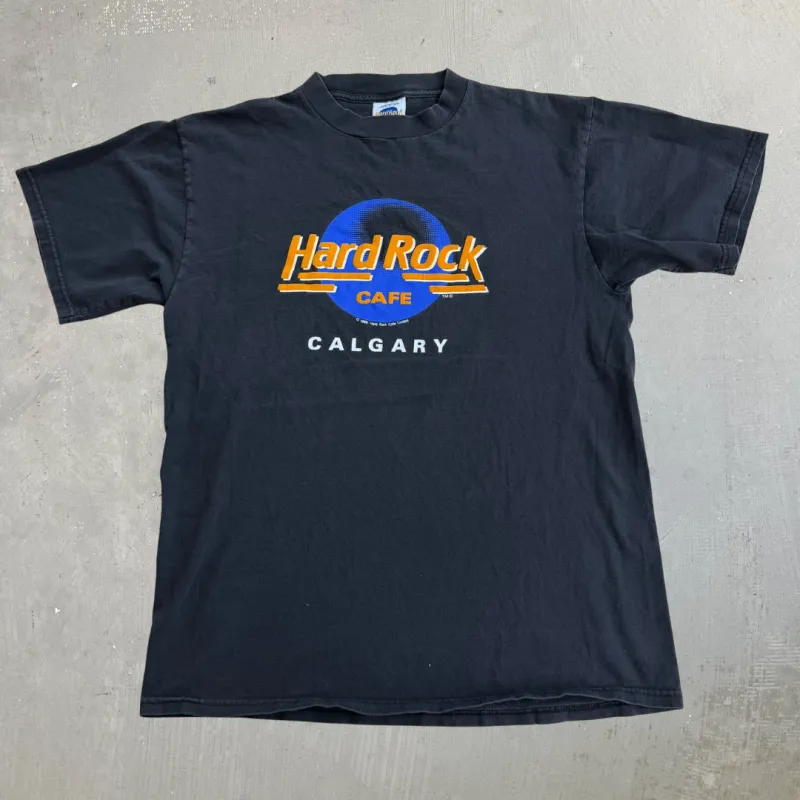 J- Vintage '89 Hard Rock Cafe Calgary Text Graphic Tee - L made by Hard Rock Cafe