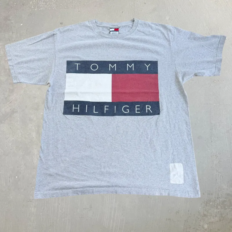 J- Vintage Tommy Hilfiger Text Graphic Made In USA Tee - XL made by HG Vintage