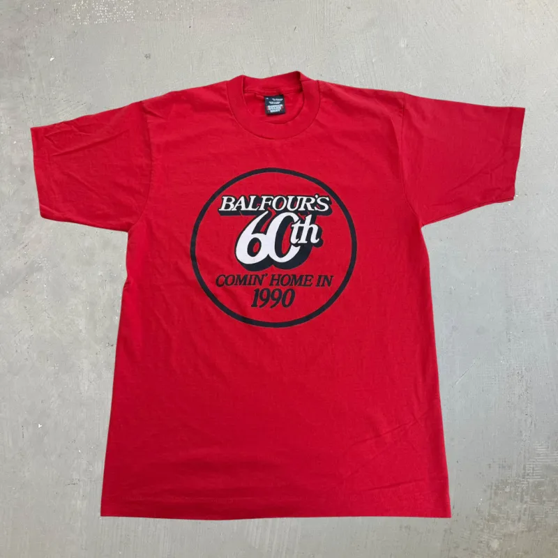 J- Vintage '90 Balfour's 60th Comin' Home In Text Graphic Single Stitch Tee - L made by HG Vintage