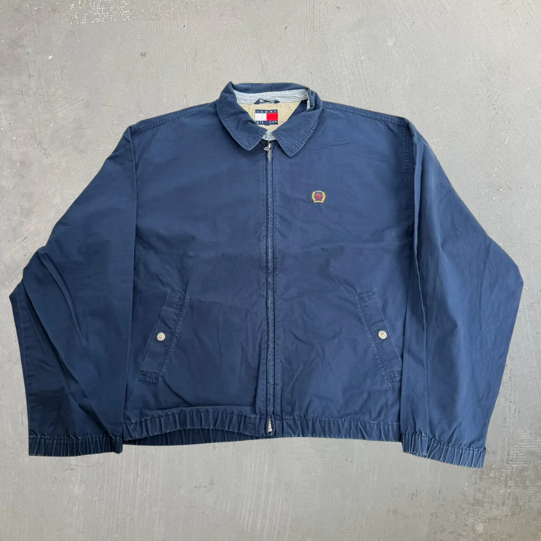 J- Vintage Tommy Hilfiger Embroidered Crest Navy Harrington Lightweight Jacket - XL sold by HG Vintage