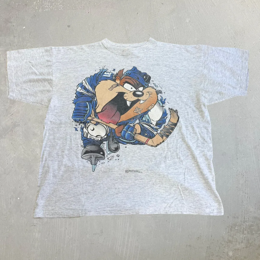 J- Vintage '95 Looney Tunes Tazmanian Devil Hockey Graphic Single Stitch Tee - XL sold by HG Vintage