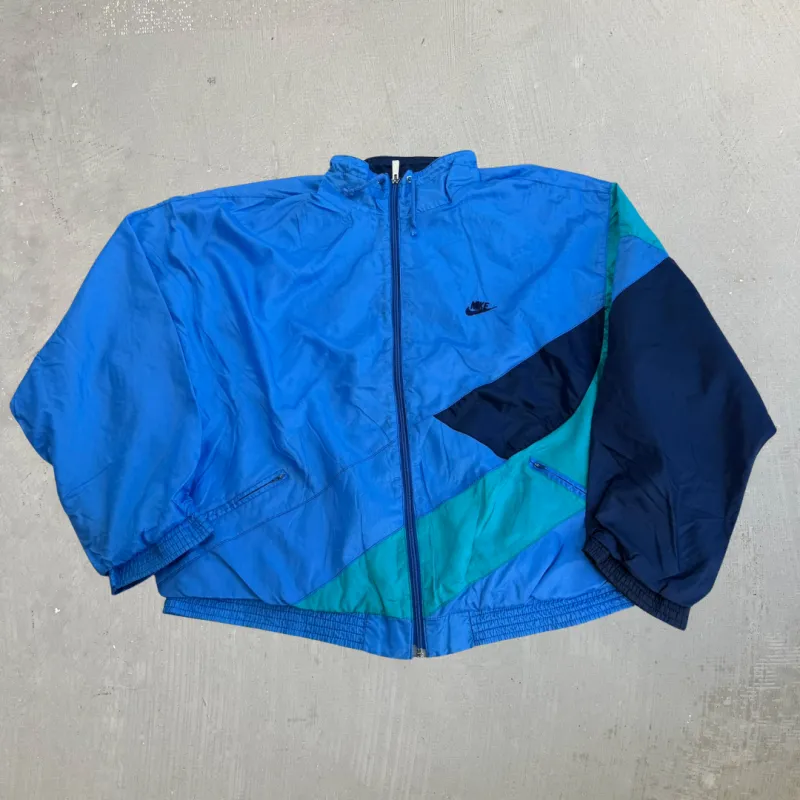 J- Vintage 90s Nike Embroidered Swoosh & Text Light Blue Zip Up Lightweight Jacket - L made by HG Vintage
