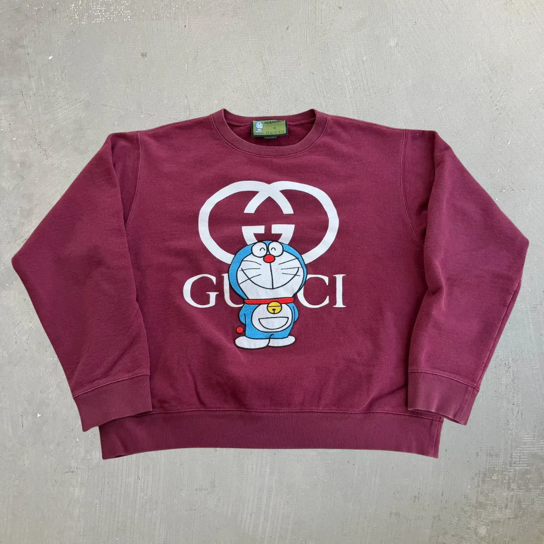 J- Bootleg Gucci Doraemon Text & Embroidered Graphic Crewneck - M sold by HG Vintage