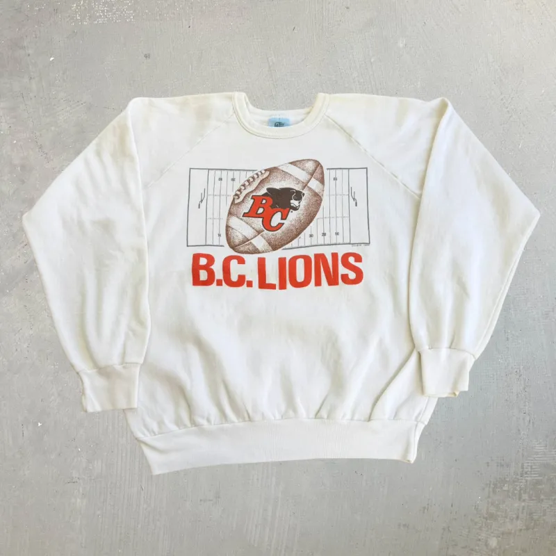 J- Vintage '86 BC Lions CFL Football Field & Logo Graphic Crewneck - XL (fits L) made by HG Vintage