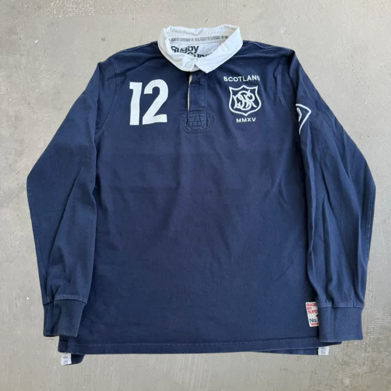 J- Vintage Superdry Scotland Embroidered Text Long Sleeve Rugby Shirt - XL made by HG Vintage