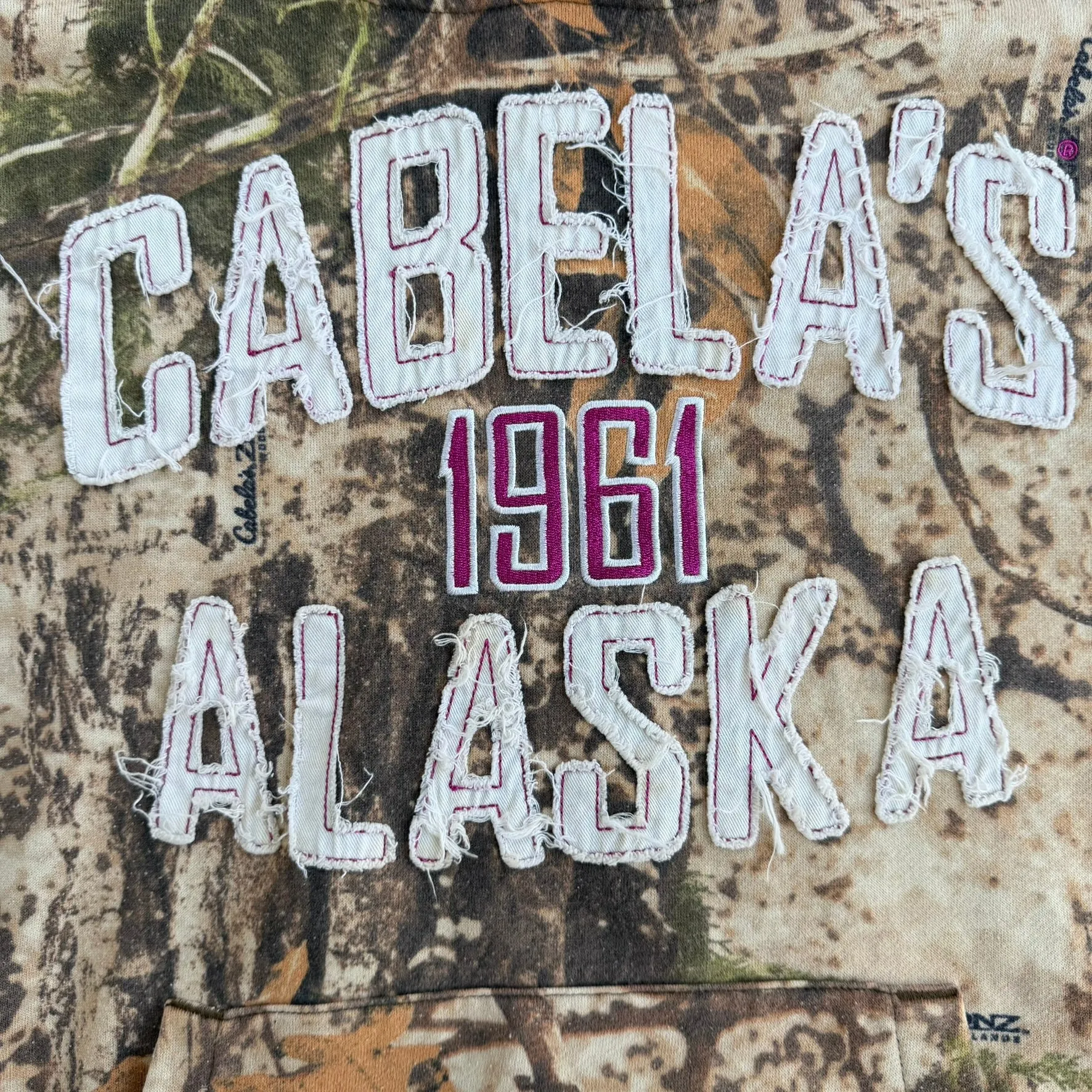 J- Vintage Cabela's Alaska Woodland Camo Embroidered Text Hoodie - XL sold by HG Vintage product image thumbnail 2
