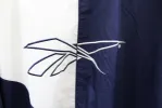 Z - Vintage 90s Reebok Embroidered Script Nylon Windbreaker sold by HG Vintage