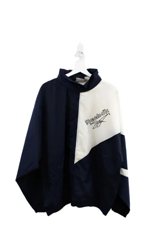 Z - Vintage 90s Reebok Embroidered Script Nylon Windbreaker sold by HG Vintage