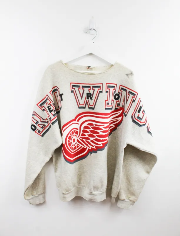NHL 90s Detroit Red Wings Text Across Sleeve & Logo Crewneck sold by HG Vintage