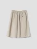 MHL. PANELLED SCOUT SKIRT | WORN COTTON DRILL | PUTTY sold by Margaret Howell