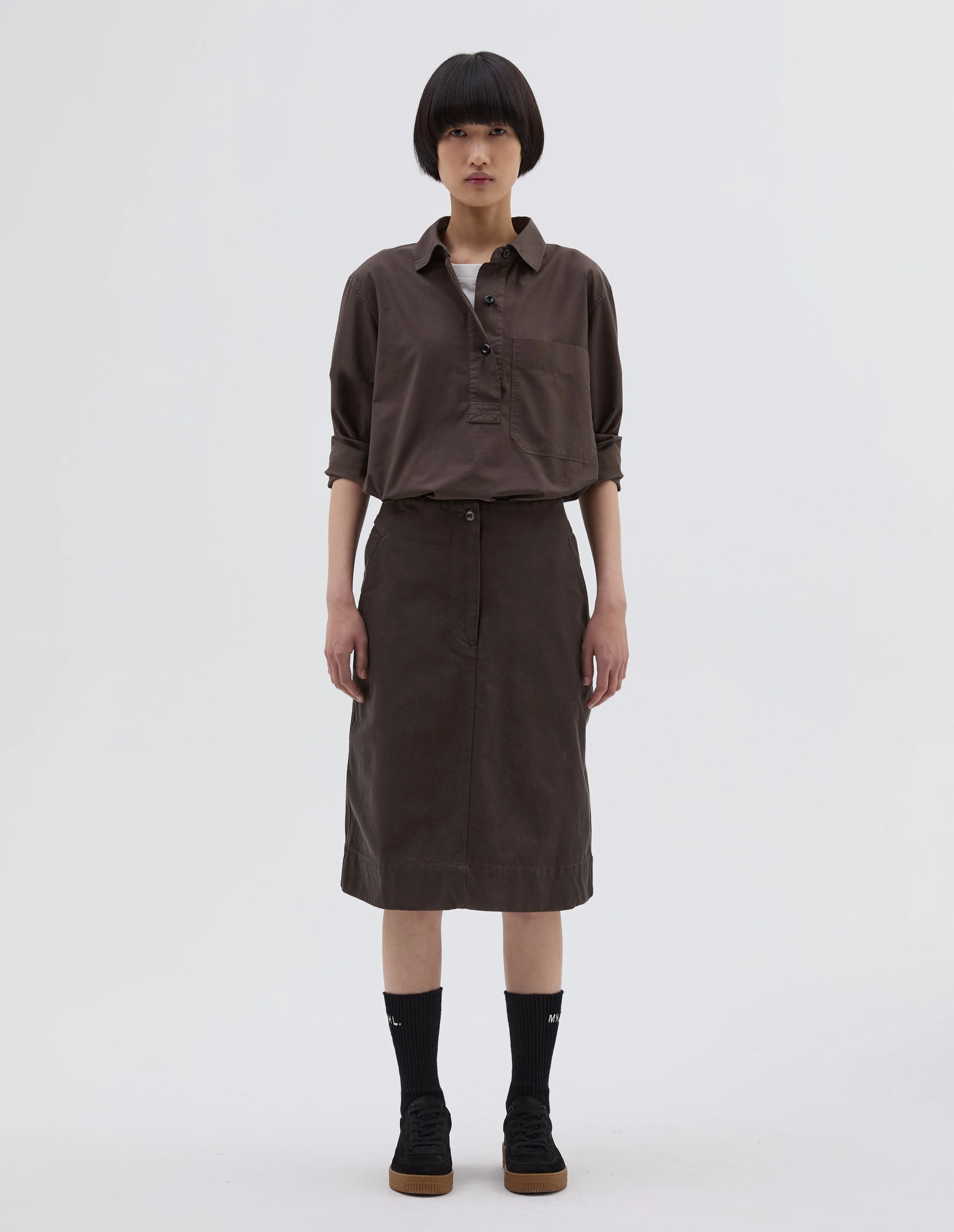 MHL. CINCH BACK SKIRT | RAISED COTTON DRILL | DARK BROWN sold by Margaret Howell