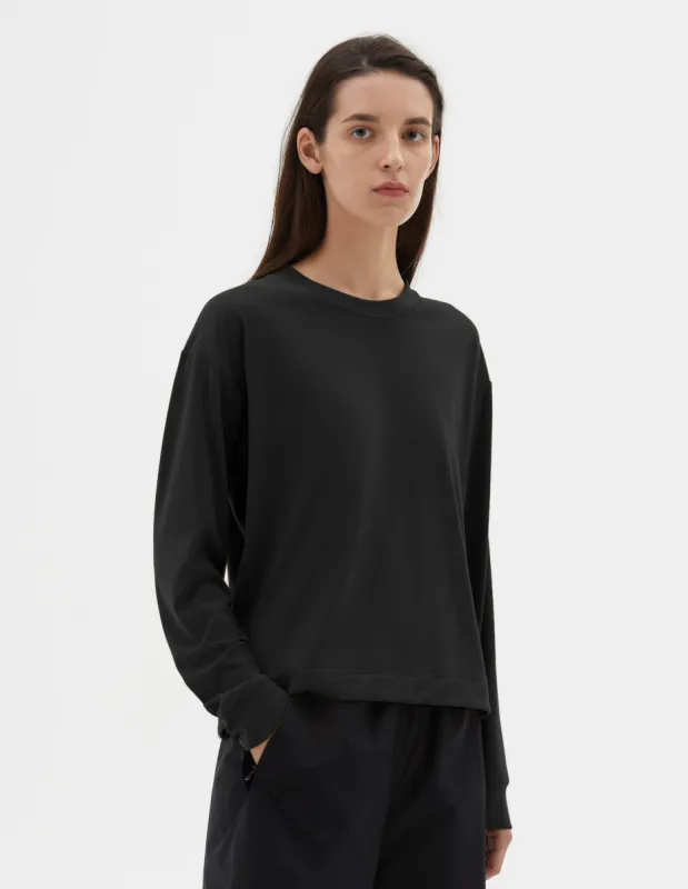MIZUNO LONG SLEEVE TRAINING TOP | RECYCLED POLYESTER JERSEY | BLACK sold by Margaret Howell