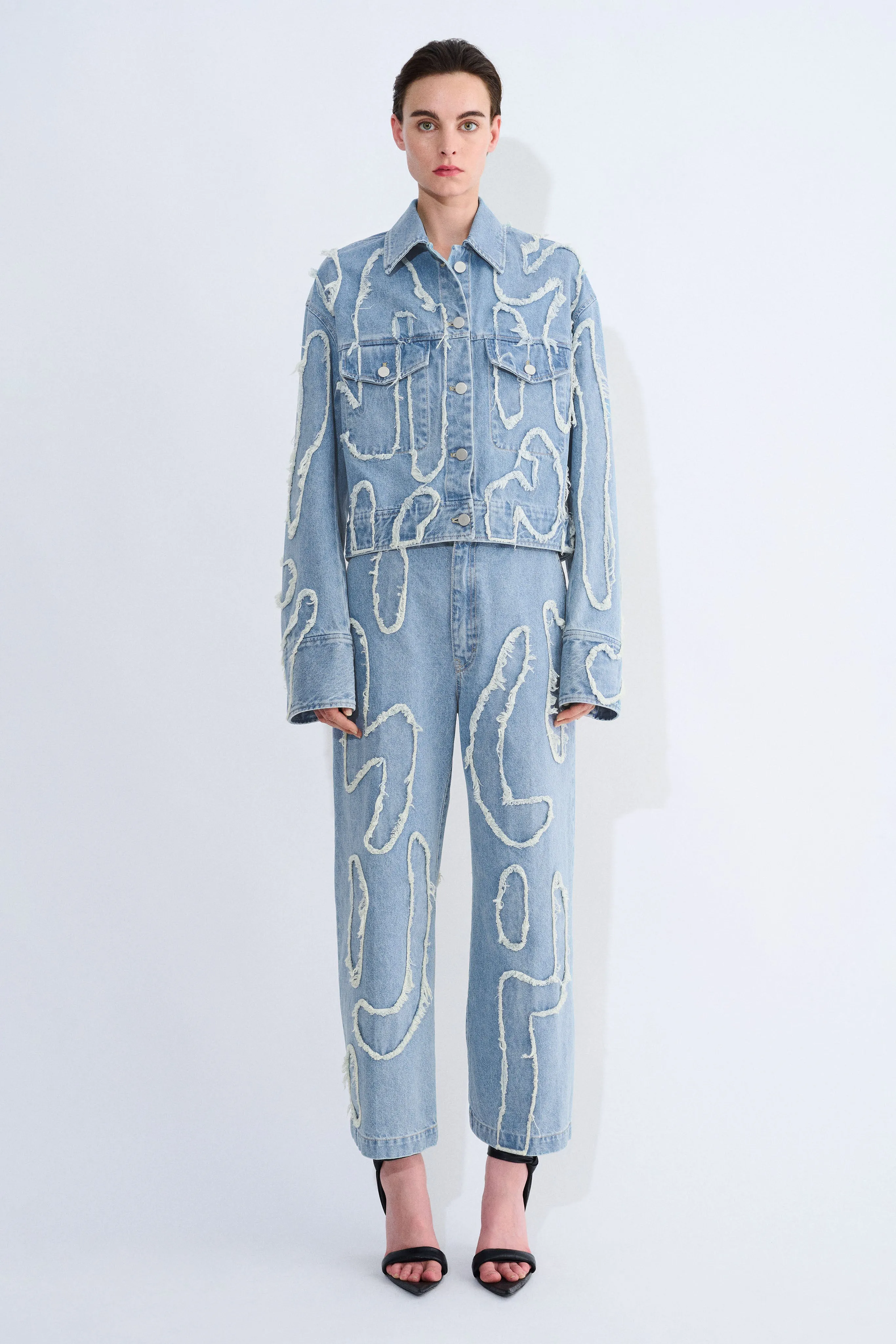 Jelani Patchwork Denim Jacket sold by Christian Wijnants