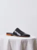 Leather Woven Slides in Black sold by Atelier Delphine