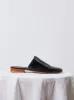 Leather Woven Slides in Black sold by Atelier Delphine