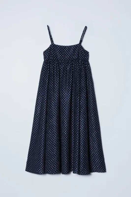 Arquette Dress in Navy Polka Dots sold by Atelier Delphine