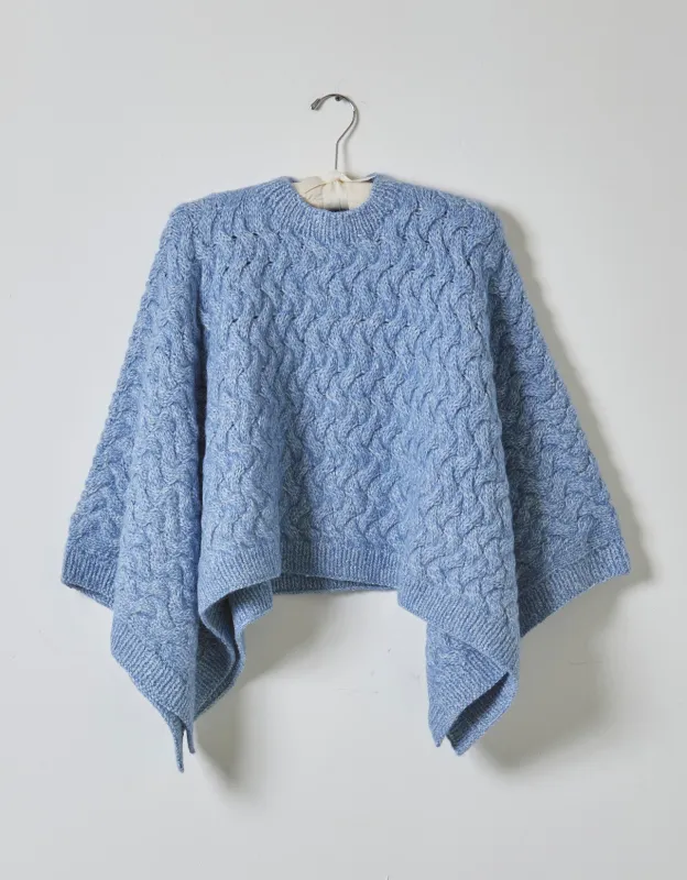 Cable hand knit poncho made by Atelier Delphine