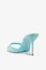 Mules in turquoise patent leather sold by Paris Texas