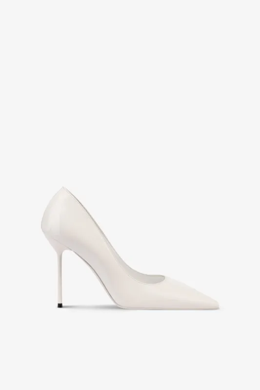Pumps in white patent leather sold by Paris Texas