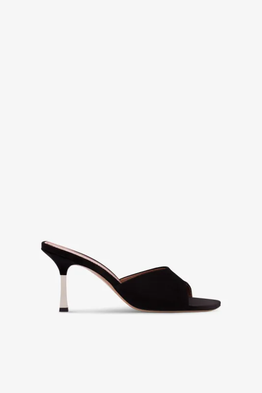 Mules in black suede leather sold by Paris Texas