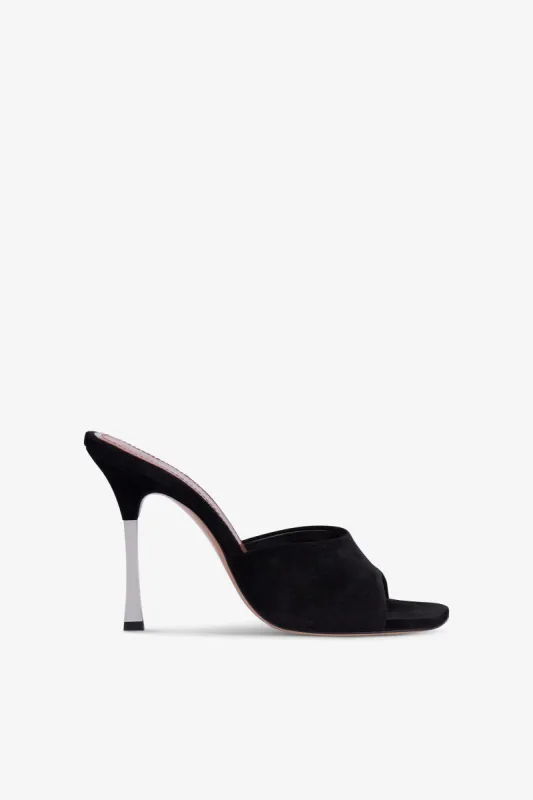Mules in black suede leather sold by Paris Texas