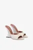 Mules in off-white and silver leather sold by Paris Texas