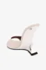 Mules in off-white and silver leather sold by Paris Texas