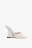 Mules in off-white and silver leather sold by Paris Texas