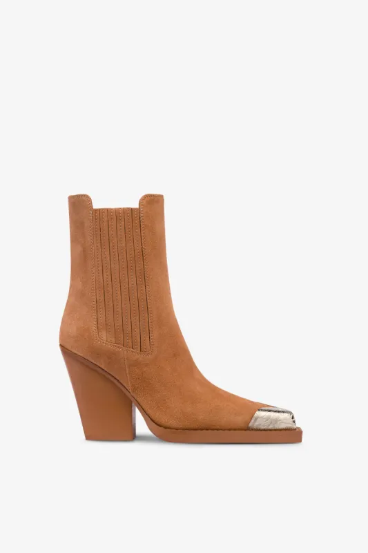 Boots in terracotta suede leather sold by Paris Texas