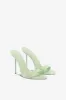 Mules in mint patent leather sold by Paris Texas