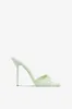 Mules in mint patent leather sold by Paris Texas