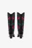 Boots in black leather sold by Paris Texas