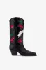 Boots in black leather sold by Paris Texas