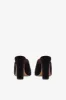 Mules in black satin sold by Paris Texas
