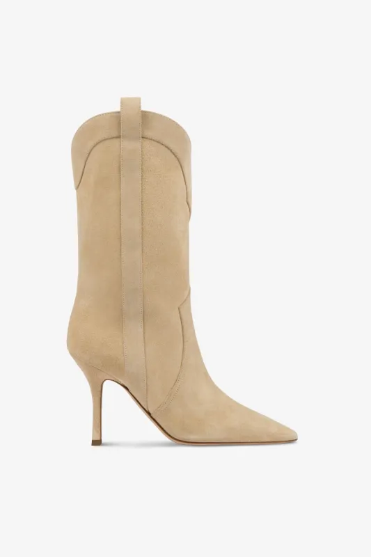 Boots in ecru suede leather sold by Paris Texas