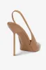 Slingbacks in caramel patent leather sold by Paris Texas